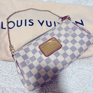 Louis Vuitton clutch/  crossbody